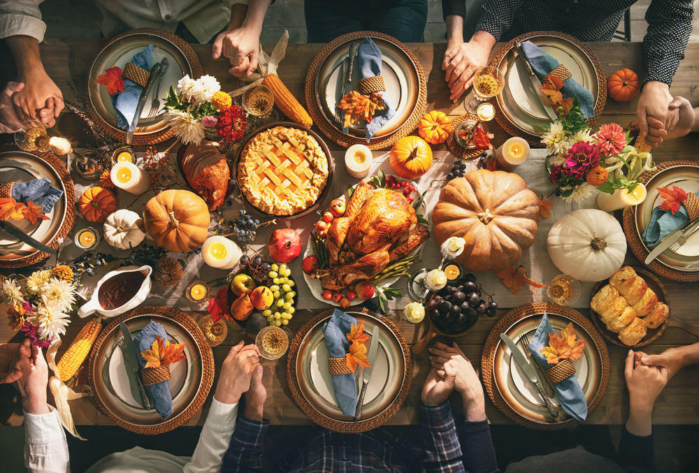 Group,of,friends,or,family,members,giving,thanks,to,god